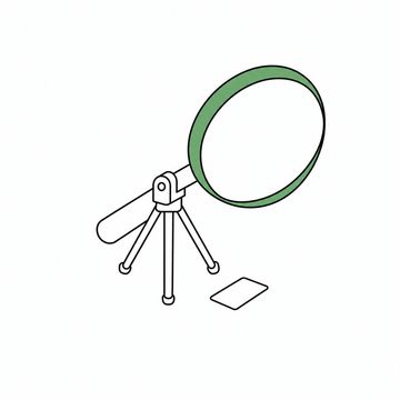 Line illustration: an enormous magnifying glass on a small tripod stand angled down over a single index card no larger than a postage stamp, the card entirely blank with no lettering or numerals, the magnifier rim the accent colour