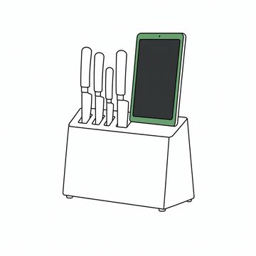 Line illustration: a wooden kitchen knife block standing upright, its slots filled with chef's knives and a slim tablet slotted into the widest opening where the cleaver belongs, the tablet's screen dark and blank with no icons or lettering and no marks or brands on the block or the blades, the tablet the accent colour